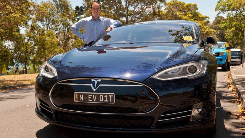 NSW independent MP Jeremy Buckingham with a Tesla Model S.