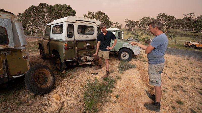 Budge checks out some old Land Rovers. Source: Jaunt Motors