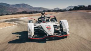 Porsche 99X electric racing car at start line for maiden Formula E season