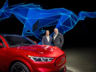 Ford executive chairman Bill Ford and president and CEO Jim Hackett next to all-electric Mustang Mach-E GT SUV at Los Angeles Auto Show 2019. Source: Ford