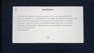 With flick of switch, Tesla adds more battery capacity to help EV owners escape bush-fires