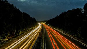 One day electric cars and trucks could charge each other on highways