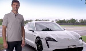 Mark Webber takes Porsche Taycan customers to race-track for an electric spin