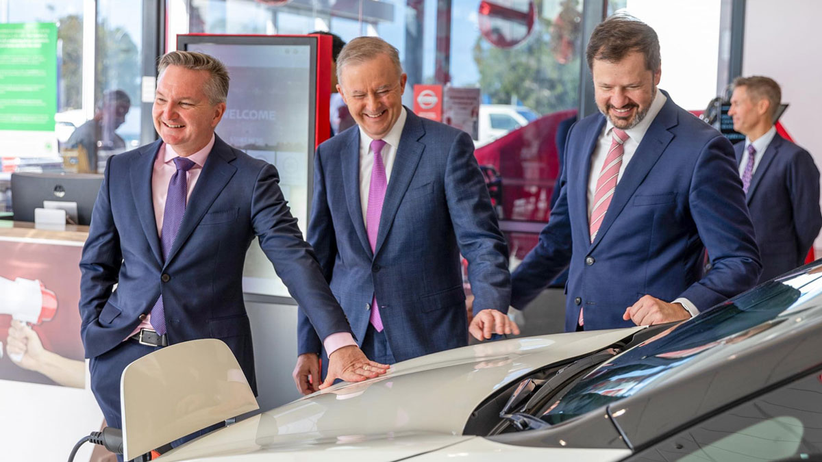 Federal Labor leader Anthony Albanese, Chris Bowen and Ed Husic visiting a Nissan Leaf electric car dealer