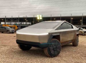 Tesla Cybertruck prototype with new mirrors spotted, Musk in driver’s seat