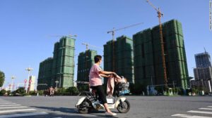 Embattled Evergrande’s auto arm vows to make first EV by early 2022
