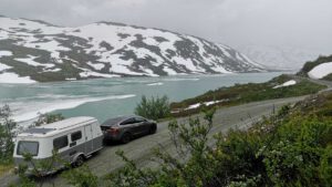 Electric vehicle group proves EVs tow boats, trailers, caravans and even diggers