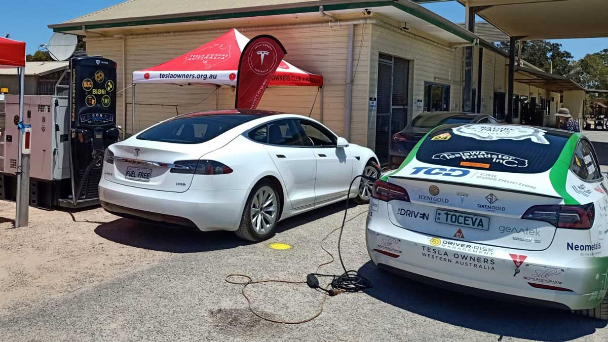 Two Tesla Model 3s - one of them a Targa West winner - at the Caiguna roadhouse. Supplied