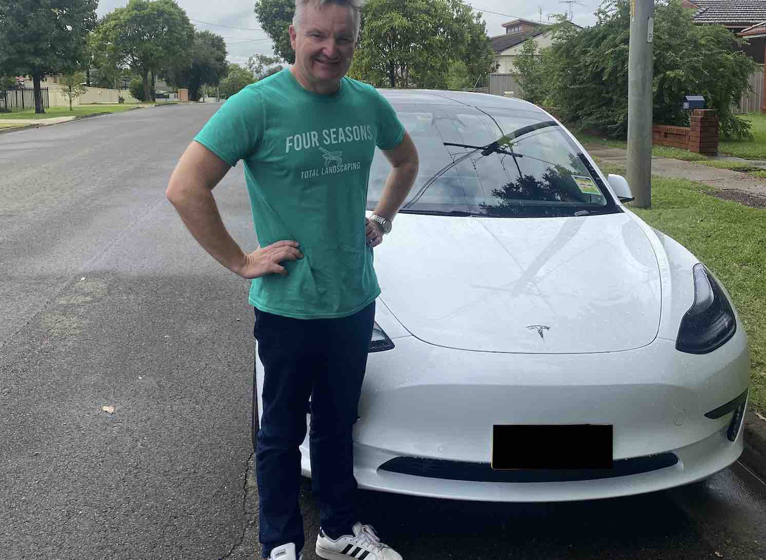 Labor's energy spokesman Chris Bowen takes delivery of new Tesla Model 3