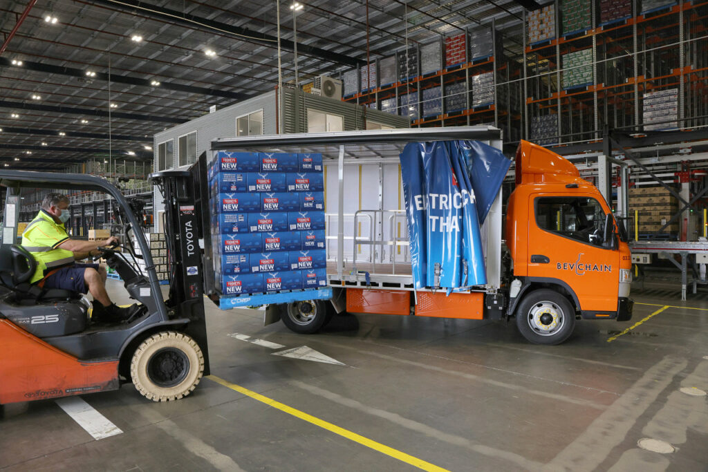 tooheys loading onto electric truck