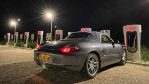 Old meets new: Converted Porsche Boxster EV charges up at Tesla Supercharger