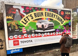 Activists target Toyota and BMW in billboard campaign, call for fossil car ad ban