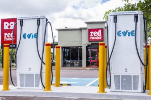 Chicken, chips and a charge: Evie launches its first EV charging station in Northern Territory
