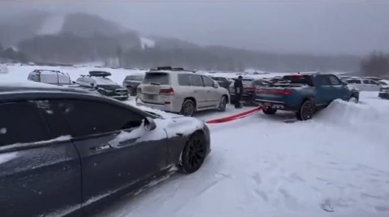 Tesla Towing Rivian R1T