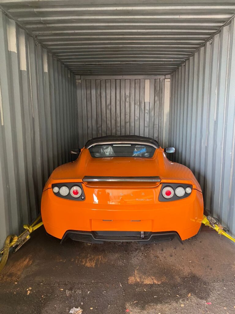 Tesla Roadster Orange via Gruber Motors