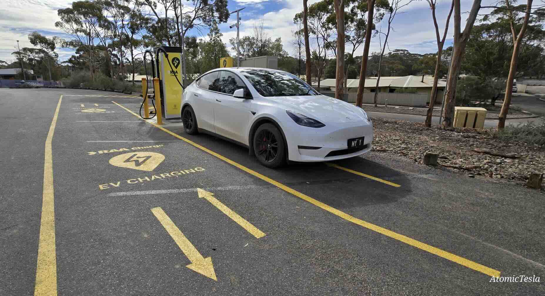 tesla model y charging-drive through