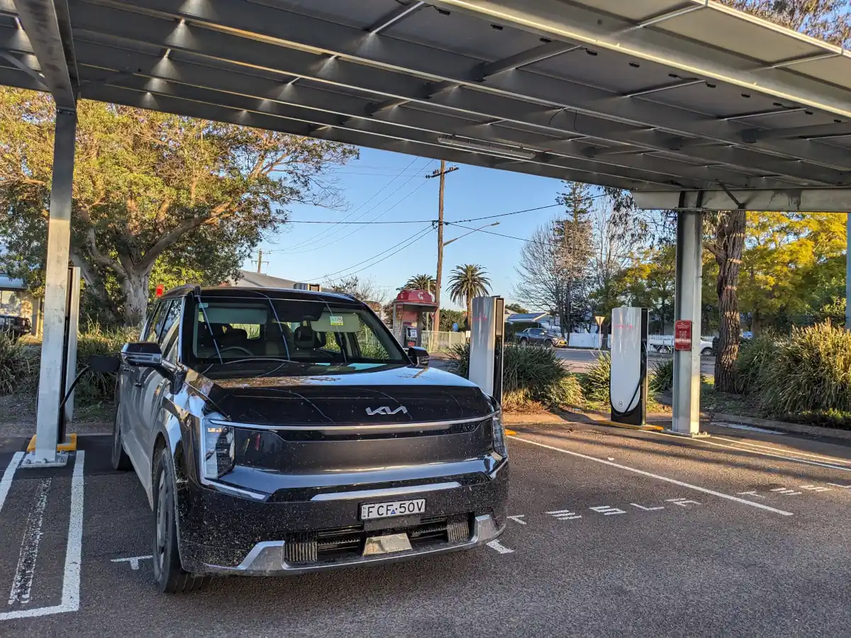 Kia EV9 charging at Tesla Supercharger in Raymond Terrace. Image: Tim Eden