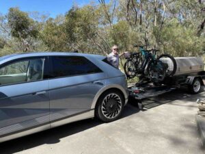 We ditched our stinky diesel ute, and hit the road with an EV and tourist trailer