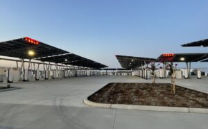 Tesla opens 168-stall Supercharger station, with solar farm and big batteries