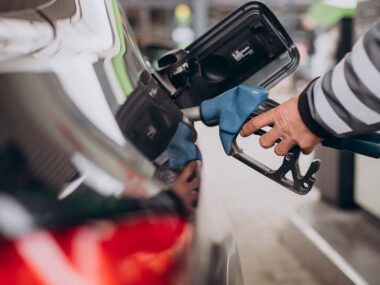 Car refueling at fuel station