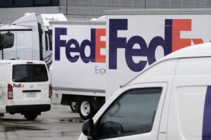 Another Australian delivery giant signs up for 55 electric vans and trucks