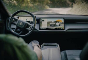 Uber backs Rivian with $US1.25bn to deploy up to 50,000 robotaxis