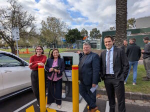 Community group launches new neighbourhood battery, with EV charging bays
