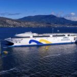 “Extraordinary moment:” World’s largest electric ferry, made in Australia, loaded on cargo ship for trip to South America